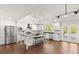 Large kitchen with an island and stainless steel appliances at 28 Shadowcreek Way, Ormond Beach, FL 32174