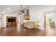 Large living room area with wood floors, staircase, natural light and open floor plan at 28 Shadowcreek Way, Ormond Beach, FL 32174