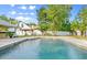 Backyard oasis features a pristine in-ground pool and patio at 28 Shadowcreek Way, Ormond Beach, FL 32174