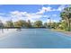 Enjoy a game on this pristine tennis court in a well-maintained community setting at 28 Shadowcreek Way, Ormond Beach, FL 32174