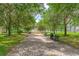 Picturesque community park featuring a brick walkway, benches, and fountain at 2811 S Asciano Ct, New Smyrna Beach, FL 32168