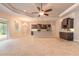 Open-concept living space featuring tile flooring and modern design elements at 2811 S Asciano Ct, New Smyrna Beach, FL 32168