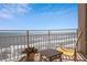 Balcony with chairs overlooking the ocean and beach at 2967 S Atlantic Ave # 1404, Daytona Beach, FL 32118