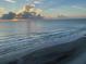Panoramic beach view on a sunny day with a wide sandy shore at 2967 S Atlantic Ave # 1404, Daytona Beach, FL 32118