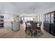 Open dining area with stylish table set, modern light fixture and scenic view beyond at 2967 S Atlantic Ave # 1404, Daytona Beach, FL 32118