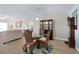 Cozy dining area featuring stylish decor, comfortable seating and seamless flow into living area at 2967 S Atlantic Ave # 1404, Daytona Beach, FL 32118