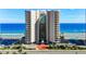 Oceanfront condo building with private balconies offering stunning views of the beach and Atlantic Ocean at 2967 S Atlantic Ave # 1404, Daytona Beach, FL 32118
