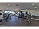 Community fitness center with modern exercise equipment and mirrors at 2967 S Atlantic Ave # 1404, Daytona Beach, FL 32118