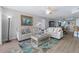Comfortable living room area with two sofas and large windows for natural light at 2967 S Atlantic Ave # 1404, Daytona Beach, FL 32118