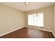 Well-lit room with vinyl floors, neutral paint, and light streaming in from the window at 3025 Bonkirk Dr, Deltona, FL 32738