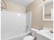 Functional bathroom with a shower-tub combo, toilet, and sink, creating a practical space at 333 Redwood Ave, Orange City, FL 32763