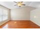 Spacious bedroom featuring a ceiling fan and large window for ample natural light at 333 Redwood Ave, Orange City, FL 32763