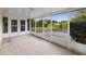 The screened-in patio provides an enjoyable area to relax with a view of the backyard at 333 Redwood Ave, Orange City, FL 32763