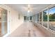 Enclosed patio features natural lighting, windows, and access to the outdoors at 333 Redwood Ave, Orange City, FL 32763