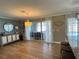 Spacious living area featuring tile floors, modern decor, and sliding doors to an outdoor space at 400 Taylorville St, Deltona, FL 32725