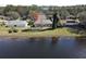 Aerial view of home situated on lake front property at 41 Ormond Green Blvd at 41 Ormond Green Blvd, Ormond Beach, FL 32174