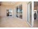 Spacious covered patio with views of backyard and lake at 41 Ormond Green Blvd, Ormond Beach, FL 32174