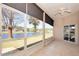 Relaxing covered patio with views of the lake at 41 Ormond Green Blvd, Ormond Beach, FL 32174