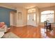 Spacious entryway featuring gleaming hardwood floors and bright, natural light at 41 Ormond Green Blvd, Ormond Beach, FL 32174