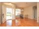 Bright entryway with hardwood floors, open layout, and natural light flowing through large windows at 41 Ormond Green Blvd, Ormond Beach, FL 32174