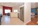 Spacious kitchen featuring stainless steel appliances, ample counter space, and a view of dining and living areas at 41 Ormond Green Blvd, Ormond Beach, FL 32174
