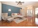Cozy living room with hardwood floors, modern furnishings, and ample natural light creating a welcoming atmosphere at 41 Ormond Green Blvd, Ormond Beach, FL 32174