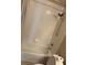 Bathroom with white tiled walls, shower head, and bathtub for a relaxing bathing experience at 417 Victoria Hills Dr, Deland, FL 32724