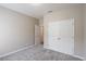 Cozy bedroom features a double door closet and neutral paint, offering a serene atmosphere at 417 Victoria Hills Dr, Deland, FL 32724