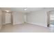 Spacious living room with bright tile and lots of space for furniture at 417 Victoria Hills Dr, Deland, FL 32724