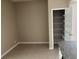 Pantry room with tiled floor, neutral walls, and wire shelving providing ample storage at 417 Victoria Hills Dr, Deland, FL 32724