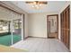 The eat-in kitchen boasts tile flooring and sliding glass doors to the enclosed lanai at 441 E Kicklighter Rd, Lake Helen, FL 32744