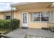 Charming front porch with decorative shutters and a well-maintained exterior at 441 E Kicklighter Rd, Lake Helen, FL 32744