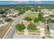 Aerial view of a single Gathering home nestled within a well-maintained, green and lush neighborhood at 486 Sycamore Springs St, Debary, FL 32713
