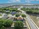Scenic aerial shot showcasing homes near a lake, lush greenery, and a well-connected road network at 486 Sycamore Springs St, Debary, FL 32713