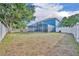 Spacious backyard with screened-in pool and privacy fence, perfect for entertaining and outdoor fun at 486 Sycamore Springs St, Debary, FL 32713