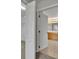 Bright bathroom with a door that reveals a double vanity, walk-in closet and great lighting at 486 Sycamore Springs St, Debary, FL 32713