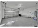 Clean and spacious garage with epoxy flooring, offering ample storage and parking space at 486 Sycamore Springs St, Debary, FL 32713