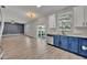 View of the kitchen, living room and pool through the glass sliding doors at 486 Sycamore Springs St, Debary, FL 32713