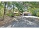 Spacious home exterior, showcasing a multi-car garage at 5265 Myakka Rd, De Leon Springs, FL 32130