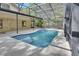 A private pool with brick trim inside a screened enclosure at 5265 Myakka Rd, De Leon Springs, FL 32130
