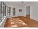 Bright sunroom with tile floors and an array of windows at 5265 Myakka Rd, De Leon Springs, FL 32130