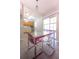 Modern dining area next to kitchen with natural light from sliding glass doors at 5519 Silent Brook Dr, Orlando, FL 32821