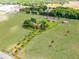 Sprawling estate featuring a grand residence, outbuildings, and picturesque grounds, offering luxury and privacy at 5549 Aragon Ave, De Leon Springs, FL 32130