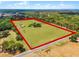 Large acreage property with defined boundaries, offering ample space and privacy in a natural setting at 5549 Aragon Ave, De Leon Springs, FL 32130