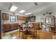 Spacious kitchen with skylights, ample counter space, dark wood cabinets and a breakfast table with seating at 5549 Aragon Ave, De Leon Springs, FL 32130