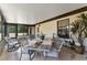 View of the lanai, which features multiple seating areas and a view of the property at 5549 Aragon Ave, De Leon Springs, FL 32130