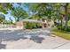 Spacious home featuring an attached three-car garage and expansive driveway offering ample parking at 6 Leisure Wood Way, Ormond Beach, FL 32174