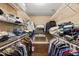 Walk-in closet with extensive storage and organization options at 6 Leisure Wood Way, Ormond Beach, FL 32174