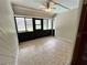 Bonus room featuring neutral paint, a ceiling fan and access to the exterior at 600 S Parkview Ave, Orange City, FL 32763
