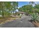 Beautiful home with a circular driveway and well-maintained landscaping enhances its curb appeal at 601 N Garfield Ave, Deland, FL 32724